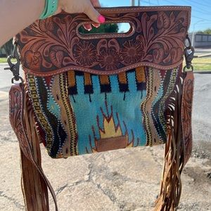 Saddle blanket purse with fringe and tooled strap